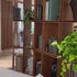 Demetra Bookcase by Porada in Canaletta walnut with brushed brass details and modular design | Casa Design Group