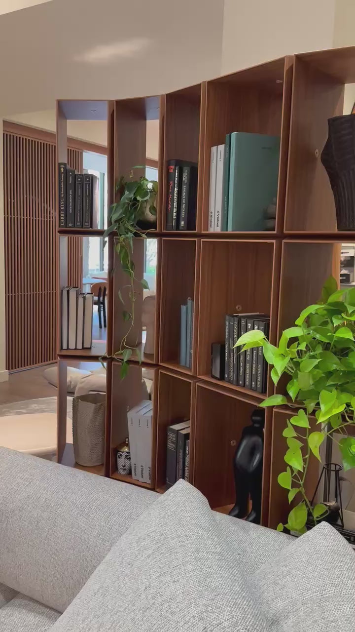 Demetra Bookcase by Porada in Canaletta walnut with brushed brass details and modular design | Casa Design Group