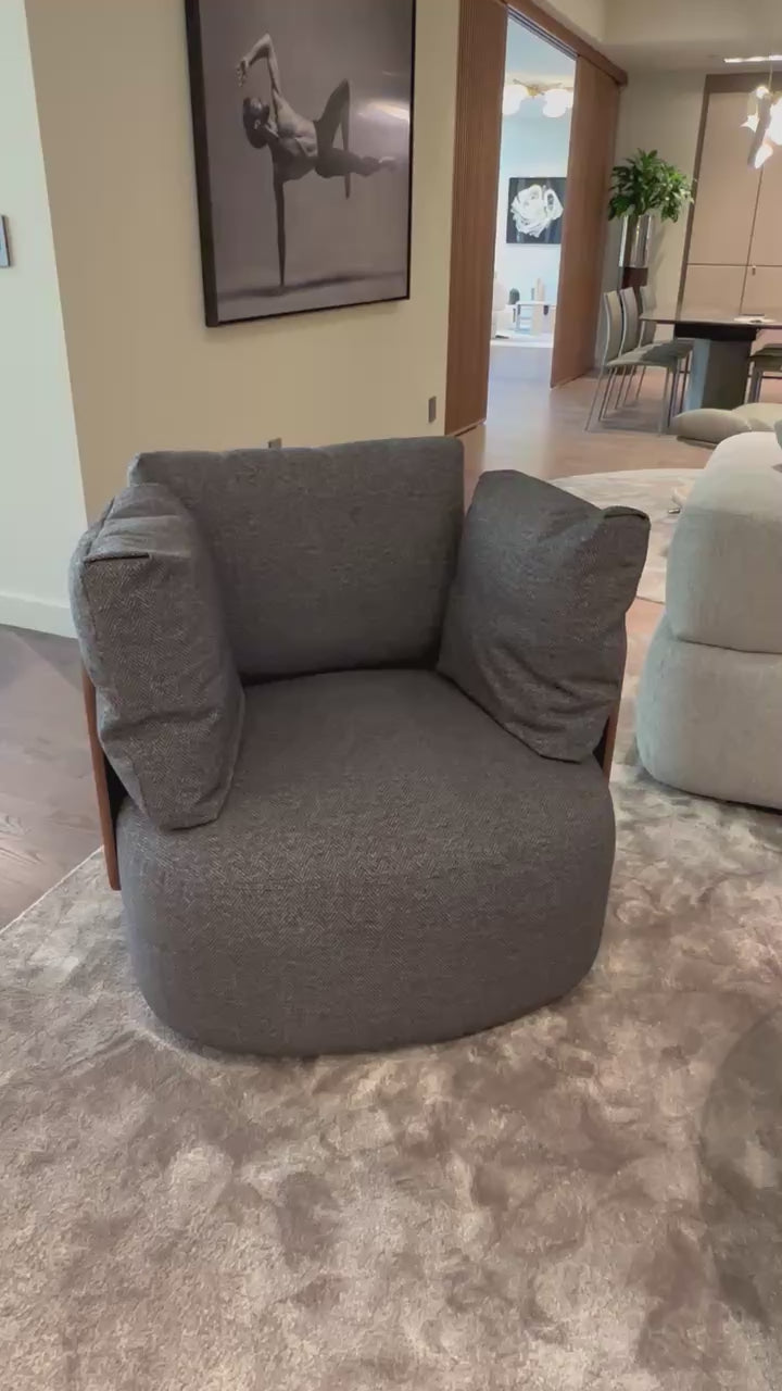 Calin Swivel Armchair by Porada with Canaletta walnut frame and upholstered seat | Casa Design Group