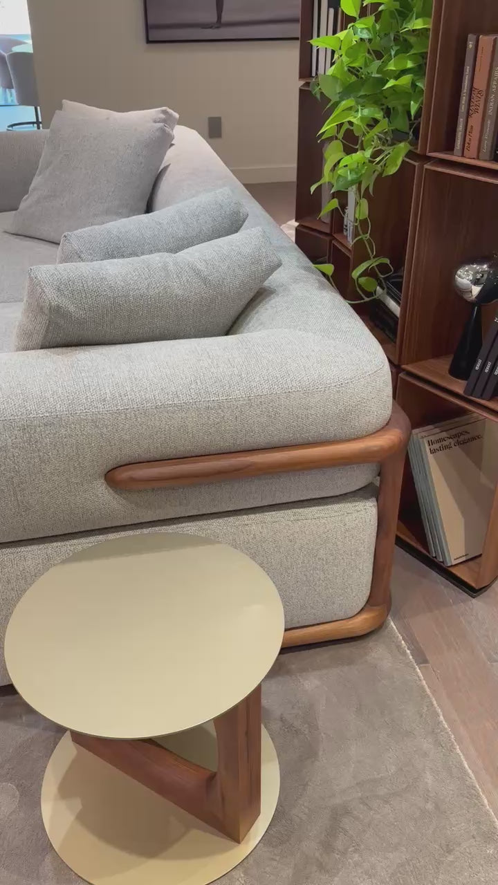 Klem floor sample sofa by Porada with Canaletta walnut frame and upholstered seating | Casa Design Group
