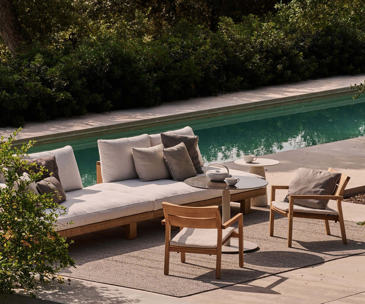 Sleek Pure Outdoor Chaise Lounge Showcasing Modular Design and Luxury Cushions | Casa Design Group