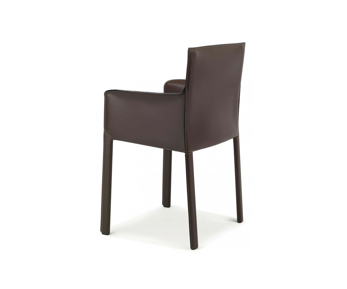 Qualina dining armchair by Enrico Pellizzoni upholstered in leather with contemporary design – Casa Design Group
