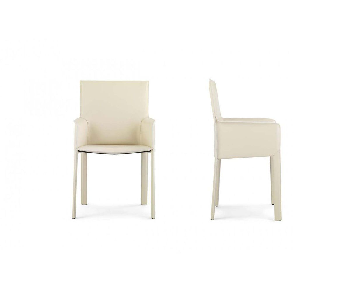Qualina dining armchair by Enrico Pellizzoni upholstered in leather with contemporary design – Casa Design Group