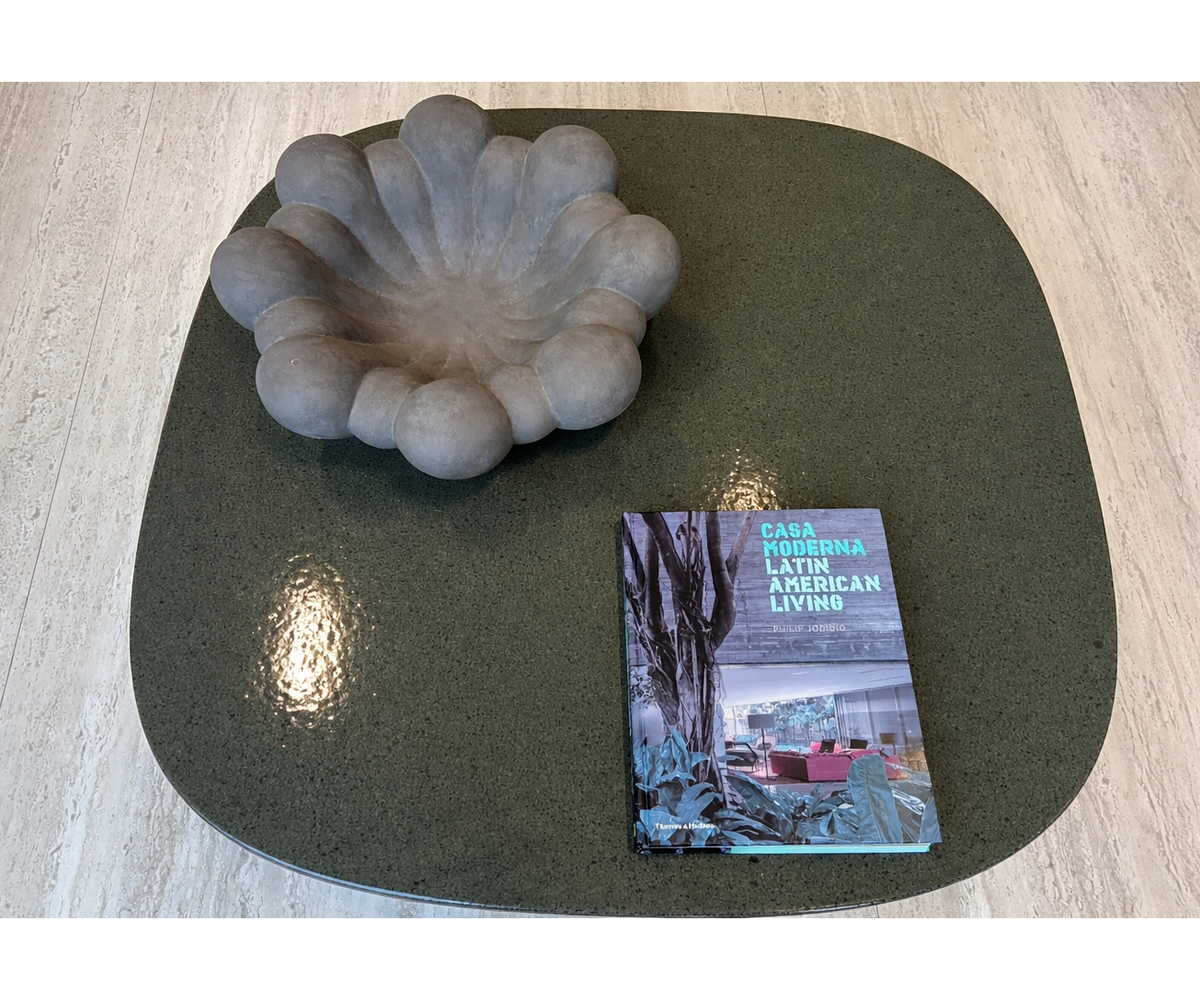 Regent Coffee Table RTQ09 by Molteni&C designed by Vincent Van Duysen with burnished metal base and lava stone top Casa Design Group