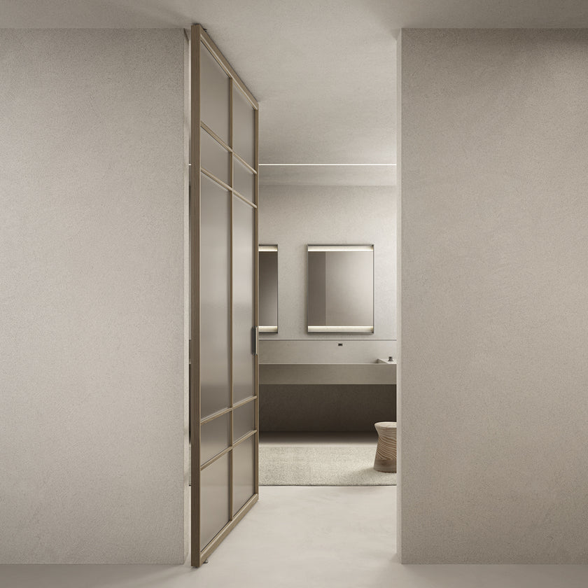 Rialto Mirrors with slender aluminum frames, rectangular reflective surfaces and optional integrated LED lighting by Rimadesio | Casa Design Group