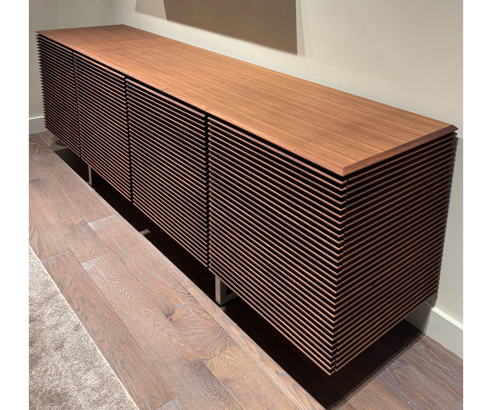 Riga Sideboard floor sample, Canaletta walnut structure, and satin chrome metal base – Casa Design Group