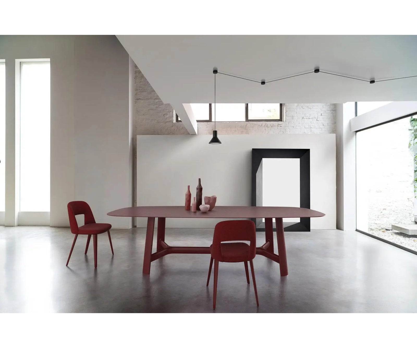 River 3358 table by Bross with solid wood base and oval top in wood glass or marble Casa Design Group