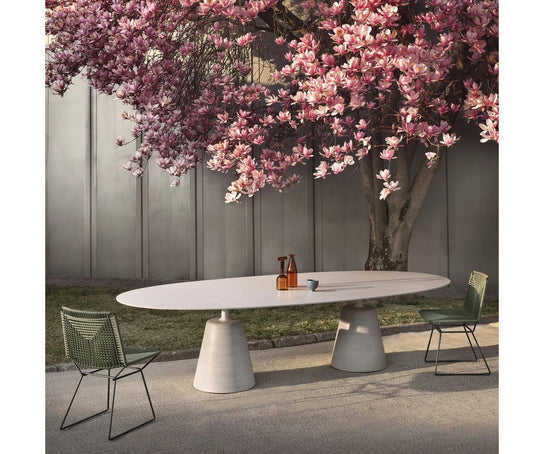 Rock Outdoor Table by MDF Italia with sculptural concrete base Casa Design Group