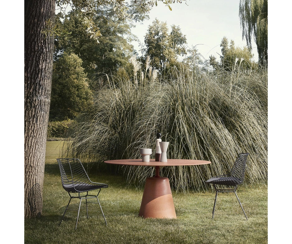 Rock Outdoor Table by MDF Italia with sculptural concrete base Casa Design Group