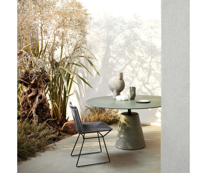 Rock Outdoor Table by MDF Italia with sculptural concrete base Casa Design Group