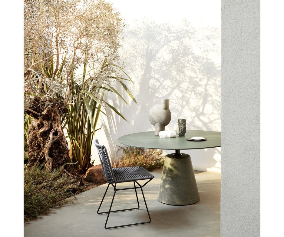 Rock Outdoor Table by MDF Italia with sculptural concrete base Casa Design Group