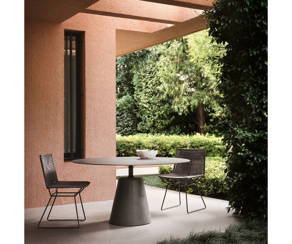 Rock Outdoor Table by MDF Italia with sculptural concrete base Casa Design Group