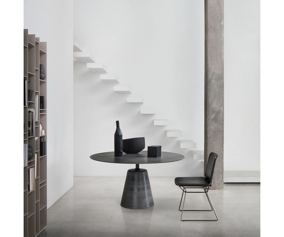 Rock Table by MDF Italia with sculptural concrete base Casa Design Group