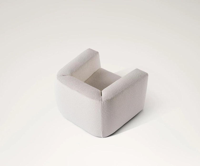 Roger Lounge Armchair by Meridiani with soft rounded upholstered design Casa Design Group