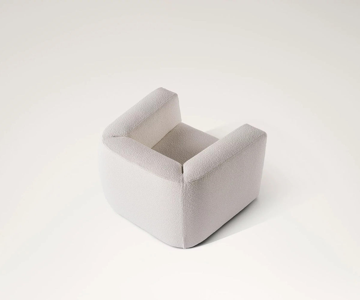 Roger Lounge Armchair by Meridiani with soft rounded upholstered design Casa Design Group