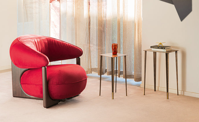 Ruby Lounge Chair with exposed ashwood frame, curved armrests and generously upholstered cushions by Cattelan Italia | Casa Design Group