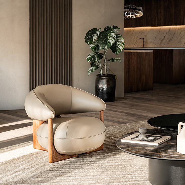 Ruby Lounge Chair with exposed ashwood frame, curved armrests and generously upholstered cushions by Cattelan Italia | Casa Design Group