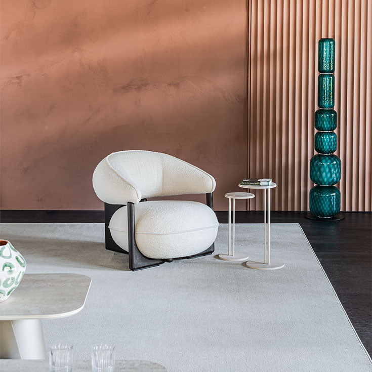 Ruby Lounge Chair with exposed ashwood frame, curved armrests and generously upholstered cushions by Cattelan Italia | Casa Design Group