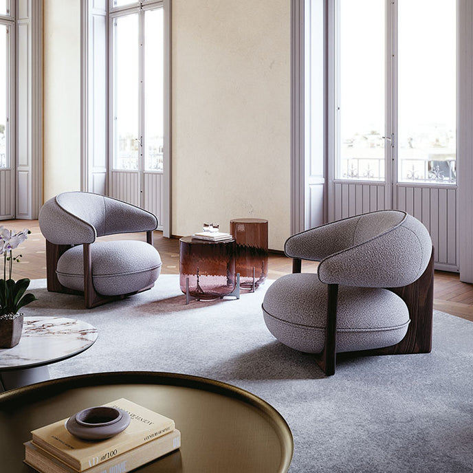 Ruby Lounge Chair with exposed ashwood frame, curved armrests and generously upholstered cushions by Cattelan Italia | Casa Design Group