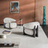 Ruby Lounge Chair with exposed ashwood frame, curved armrests and generously upholstered cushions by Cattelan Italia | Casa Design Group