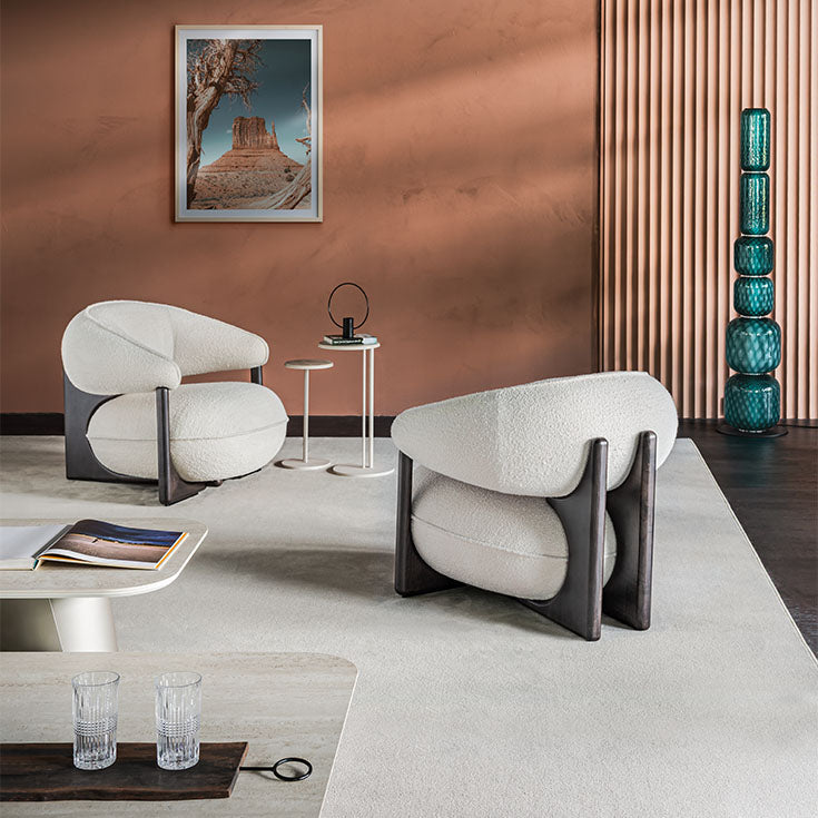 Ruby Lounge Chair with exposed ashwood frame, curved armrests and generously upholstered cushions by Cattelan Italia | Casa Design Group