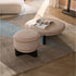RUFUS modern upholstered pouf with wooden base | Casa Design Group