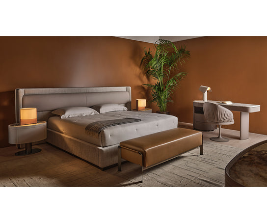 Arthur Bench by Rugiano with premium fabric or leather upholstery and a bronze-finished aluminium base | Casa Design Group