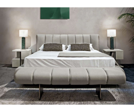 Rugiano Snake upholstered designer bench with bronze aluminum base at Casa Design Group.