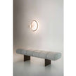 Rugiano Snake upholstered designer bench with bronze aluminum base at Casa Design Group.