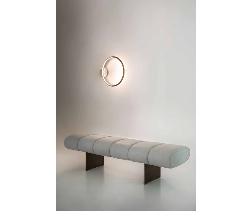 Rugiano Snake upholstered designer bench with bronze aluminum base at Casa Design Group.