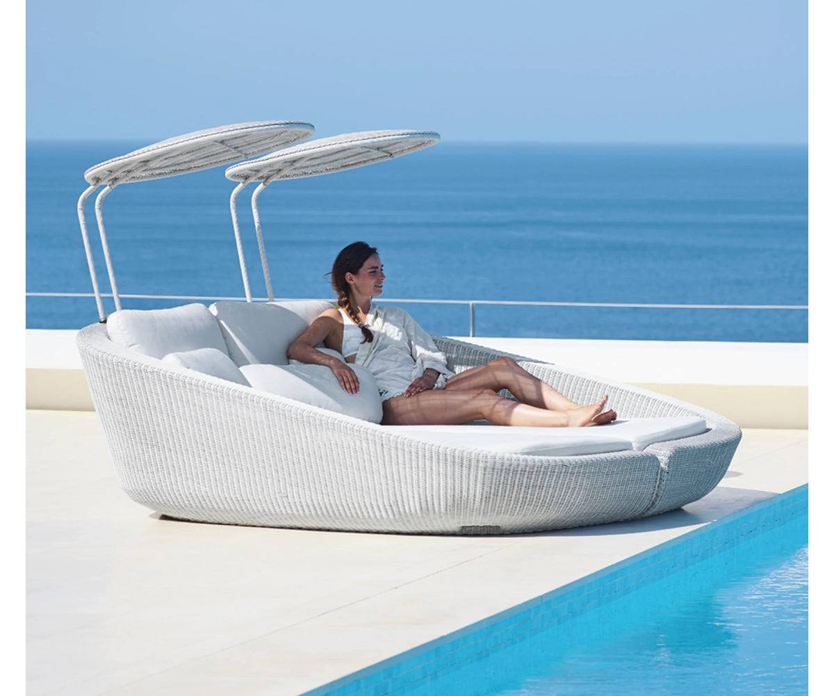 Luxury Savannah Daybed with Kingston Side Table by Cane-line outdoor furniture set – Casa Design Group