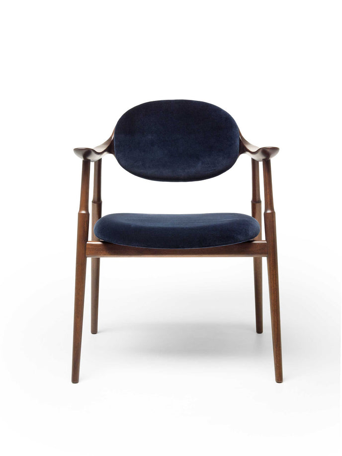 Scapula Dining Chair with sculpted solid wood frame, curved backrest and upholstered seat by Ceccotti Collezioni | Casa Design Group