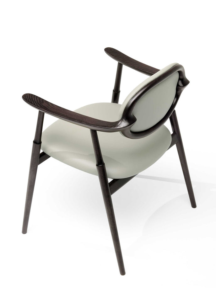 Scapula Dining Chair with sculpted solid wood frame, curved backrest and upholstered seat by Ceccotti Collezioni | Casa Design Group