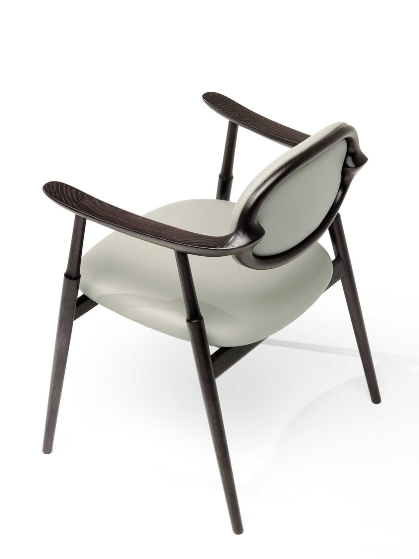 Scapula Dining Chair with sculpted solid wood frame, curved backrest and upholstered seat by Ceccotti Collezioni | Casa Design Group