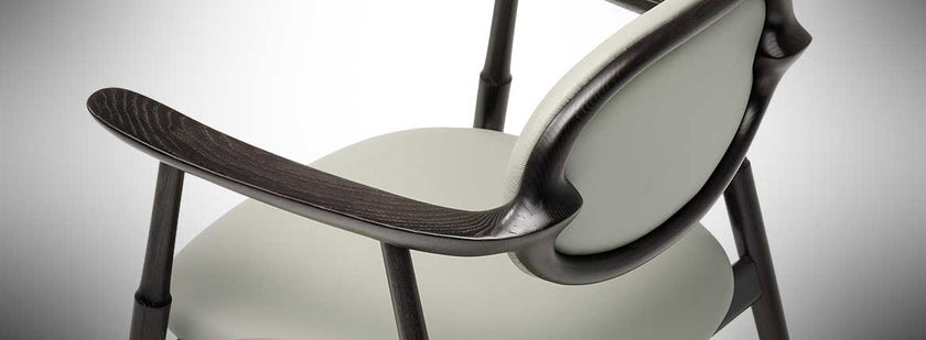 Scapula Dining Chair with sculpted solid wood frame, curved backrest and upholstered seat by Ceccotti Collezioni | Casa Design Group