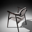 Scapula Dining Chair with sculpted solid wood frame, curved backrest and upholstered seat by Ceccotti Collezioni | Casa Design Group