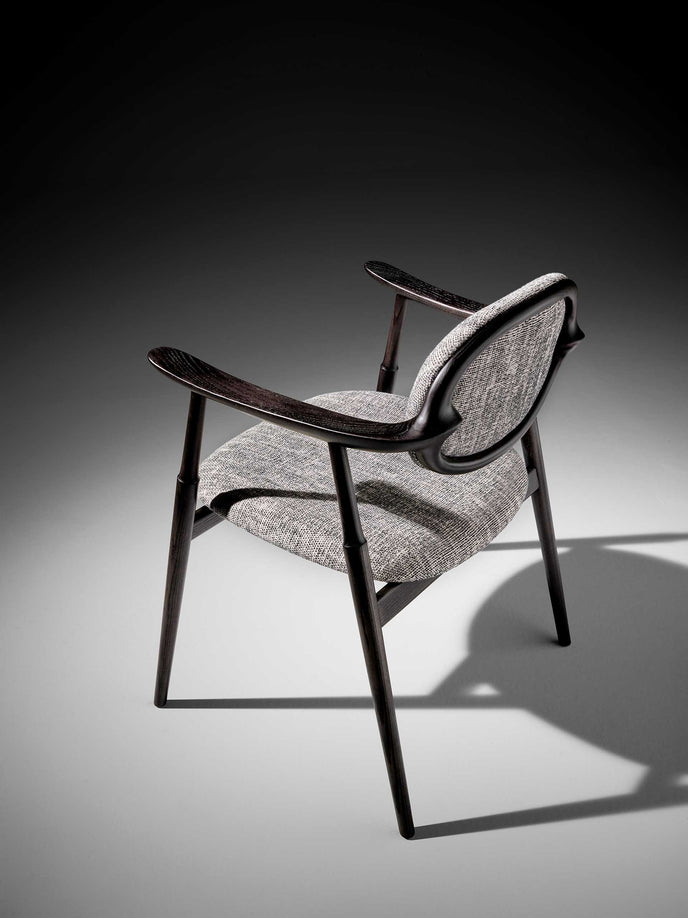 Scapula Dining Chair with sculpted solid wood frame, curved backrest and upholstered seat by Ceccotti Collezioni | Casa Design Group