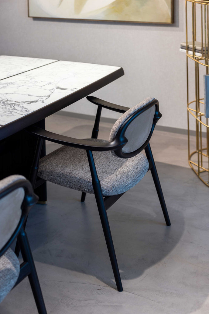 Scapula Dining Chair with sculpted solid wood frame, curved backrest and upholstered seat by Ceccotti Collezioni | Casa Design Group