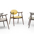 Scapula Dining Chair with sculpted solid wood frame, curved backrest and upholstered seat by Ceccotti Collezioni | Casa Design Group