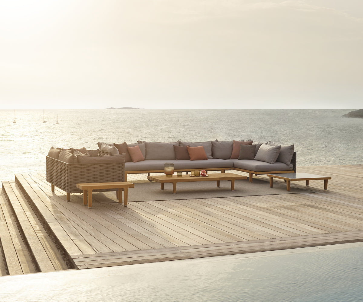 Contemporary outdoor teak coffee table by Dedon – Sealine collection at Casa Design Group