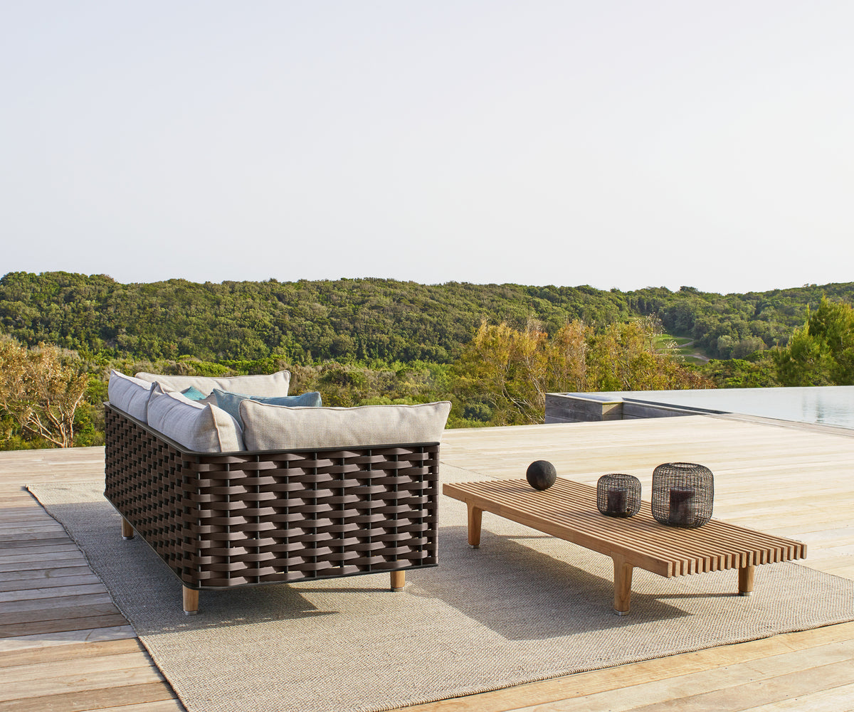 Contemporary outdoor teak coffee table by Dedon – Sealine collection at Casa Design Group