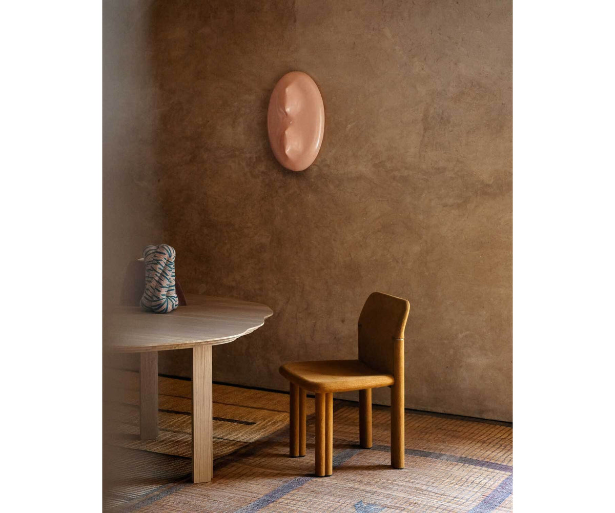 Tacchini Sempronia Chair featuring unique design and vintage comfort | Casa Design Group