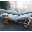 Plush Senja Outdoor Chaise Lounge with teak side table for Ultimate Outdoor Relaxation | Casa Design Group