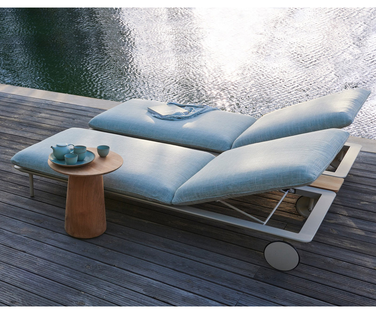 Plush Senja Outdoor Chaise Lounge with teak side table for Ultimate Outdoor Relaxation | Casa Design Group