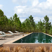Plush Senja Outdoor Chaise Lounge with teak side table for Ultimate Outdoor Relaxation | Casa Design Group