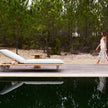 Plush Senja Outdoor Chaise Lounge with teak side table for Ultimate Outdoor Relaxation | Casa Design Group