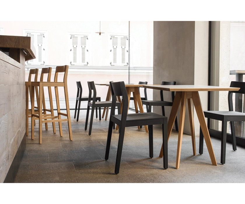 Sit Dining Chair by Zeitraum featuring solid wood construction, stackable functionality, and timeless contemporary design | Casa Design Group