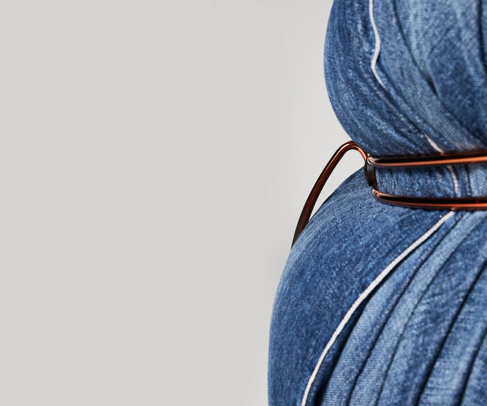 Soriana Lounge Chair Denim Crafted by Roy Roger's® by Cassina designed by Afra & Tobia Scarpa.