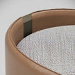 Suite elegant upholstered pouf by Capital with curved shell design and deep cushioned seat | Casa Design Group