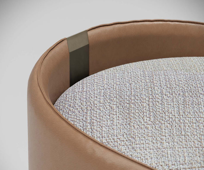 Suite elegant upholstered pouf by Capital with curved shell design and deep cushioned seat | Casa Design Group